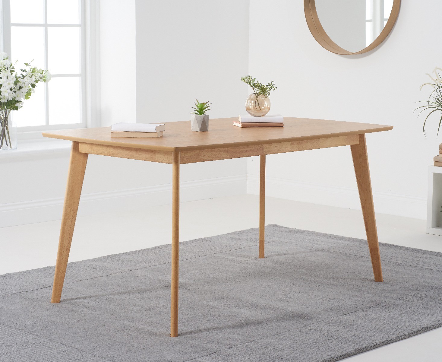Product photograph of Sacha Oak 150cm Dining Table from Oak Furniture Superstore