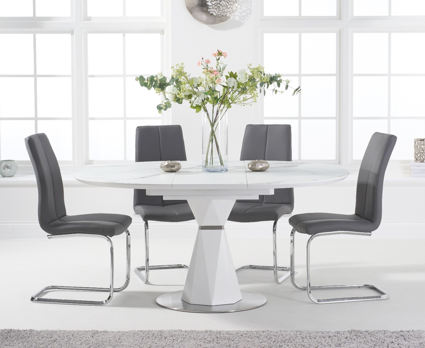Product photograph of Venosa 120cm Round White Extending Dining Table With 6 Grey Gianni Chairs from Oak Furniture Superstore
