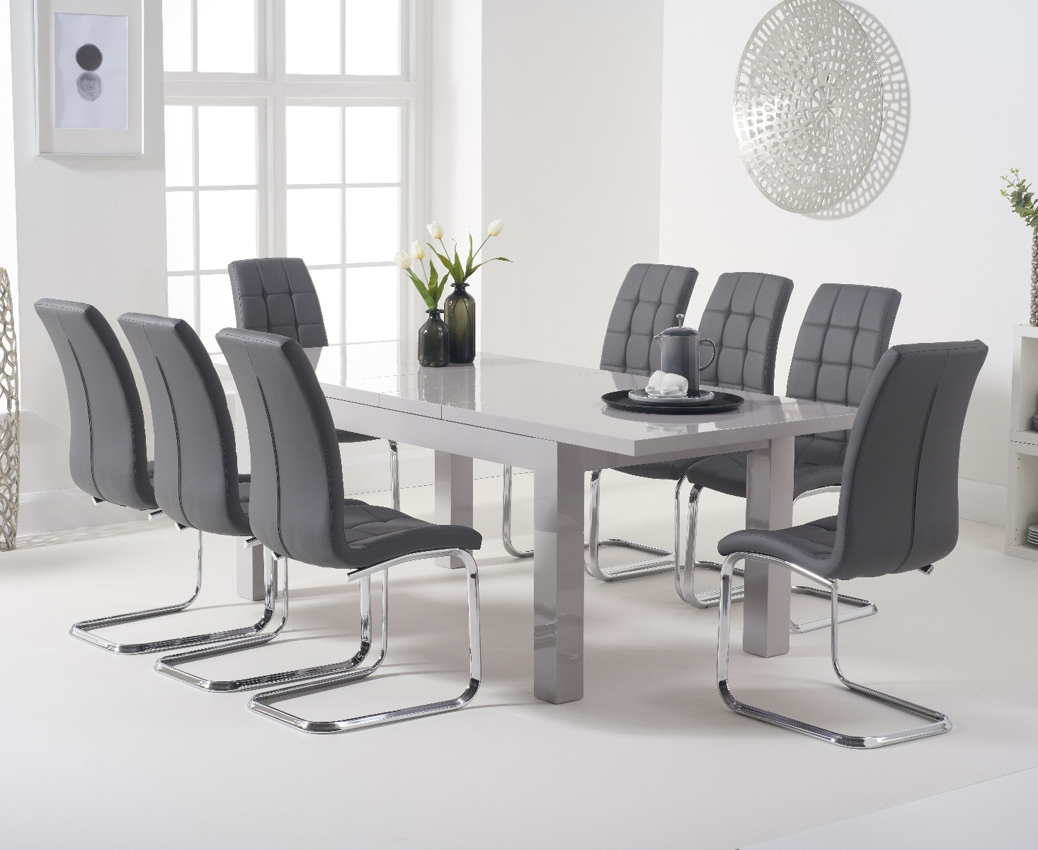 Product photograph of Atlanta Light Grey Gloss 160-220cm Extending Dining Table With 6 White Vigo Chairs from Oak Furniture Superstore