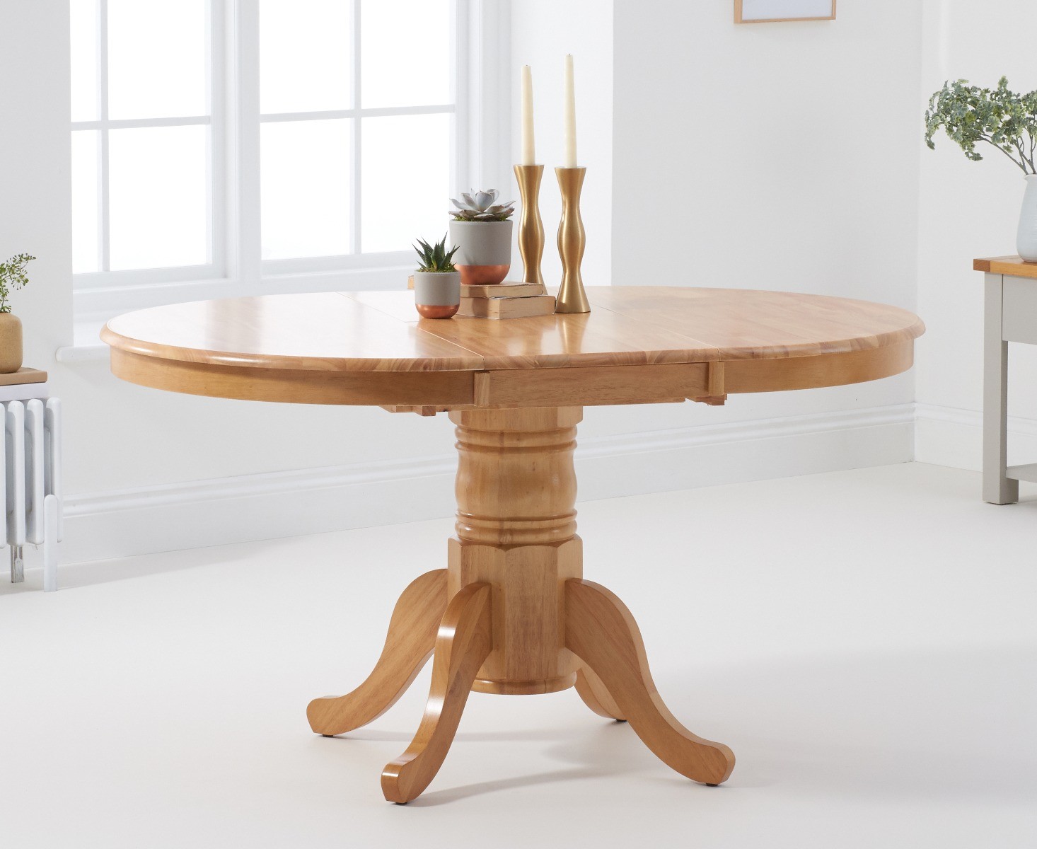 Product photograph of Extending Epsom Oak Pedestal Table from Oak Furniture Superstore