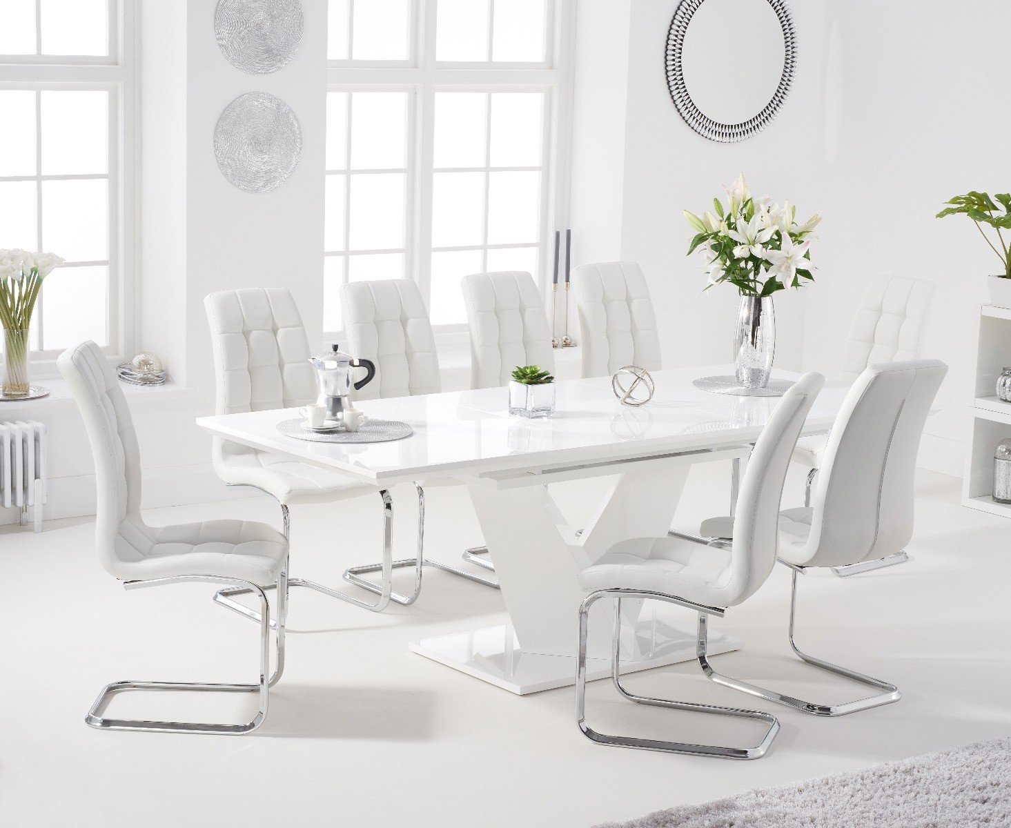 Product photograph of Vittorio 160cm White High Gloss Extending Dining Table With 6 Black Vigo Faux Leather Chairs from Oak Furniture Superstore