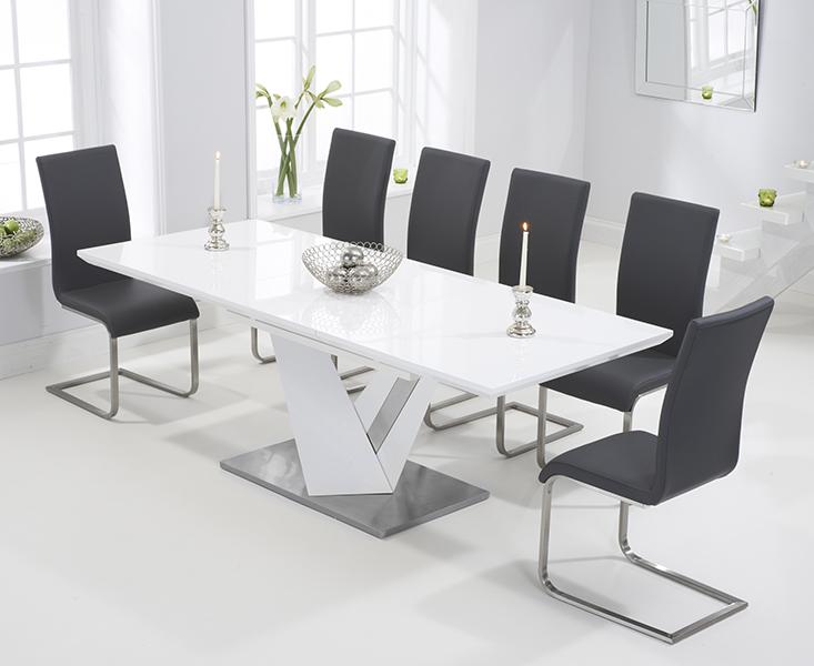 Product photograph of Santino 160cm White High Gloss Extending Dining Table With 6 Black Austin Chairs from Oak Furniture Superstore