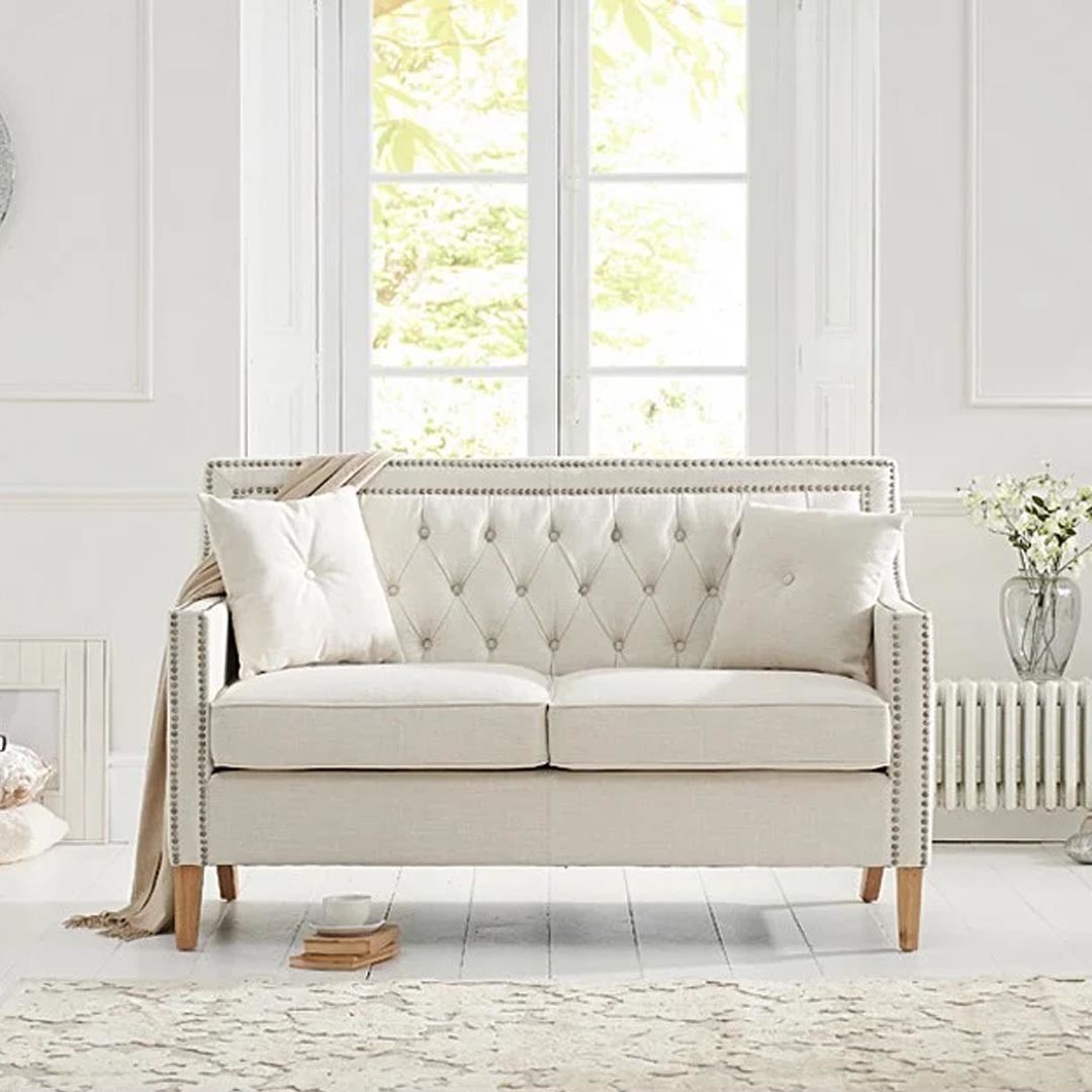 Product photograph of Chatsworth Chesterfield Ivory Linen 2 Seater Sofa from Oak Furniture Superstore