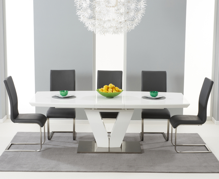 Product photograph of Palermo 180cm White High Gloss Extending Dining Table With 6 Black Austin Chairs from Oak Furniture Superstore