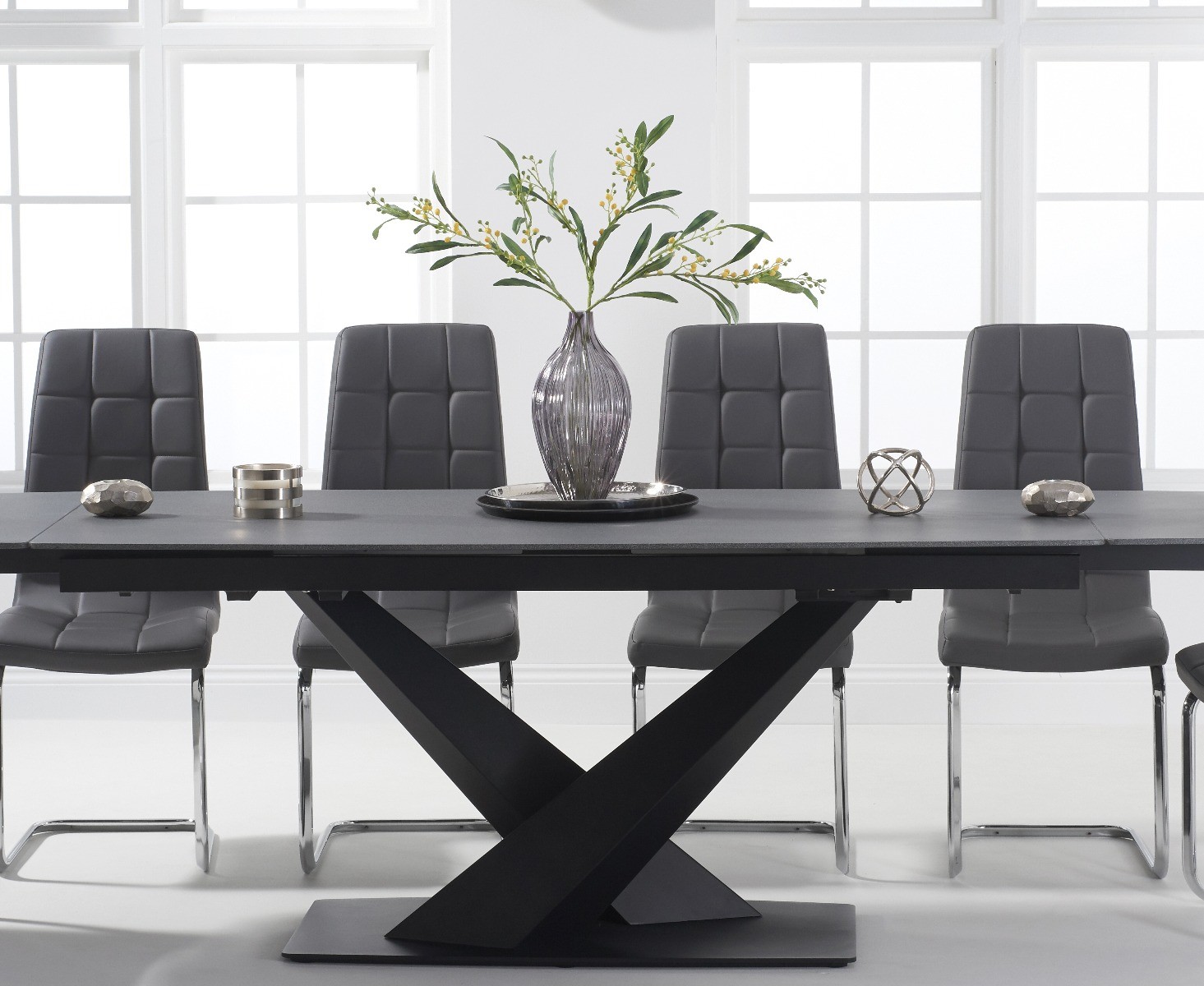 Photo 2 of Extending jacob 180cm grey stone dining table with 12 black vigo chairs