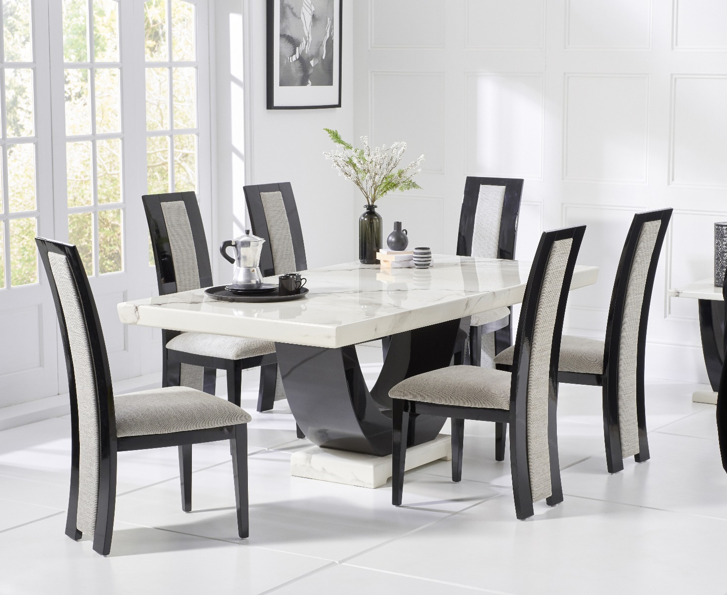 Product photograph of Raphael 170cm White And Black Pedestal Marble Dining Table With 6 Black Novara Chairs from Oak Furniture Superstore