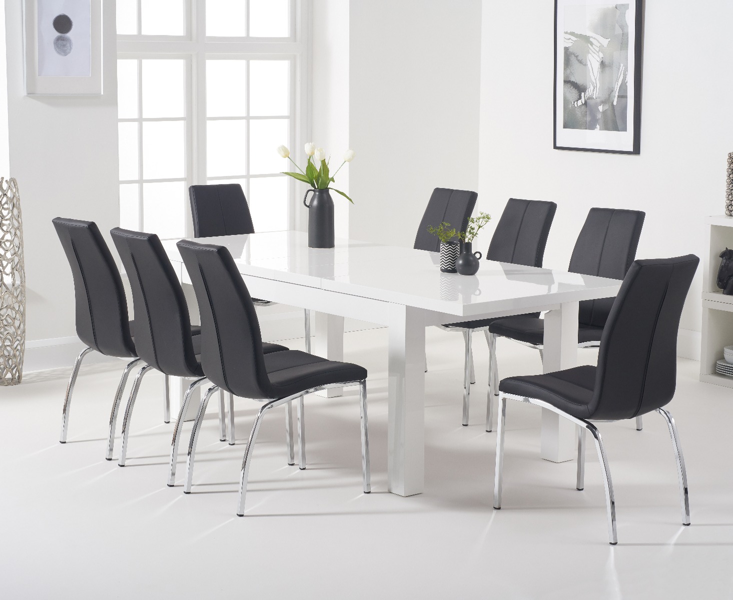 Product photograph of Extending Atlanta 160cm White High Gloss Dining Table With 4 Black Marco Chairs from Oak Furniture Superstore