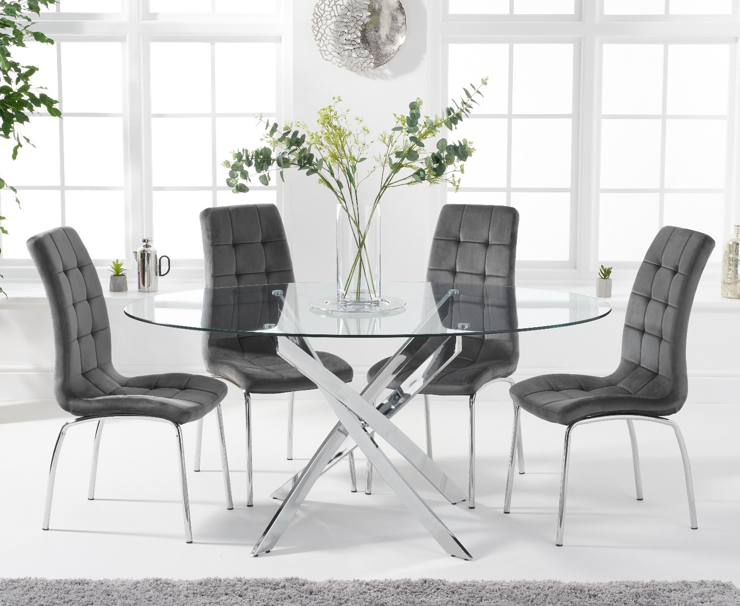 Product photograph of Bernini 165cm Oval Glass Dining Table With 6 Grey Enzo Velvet Chairs from Oak Furniture Superstore