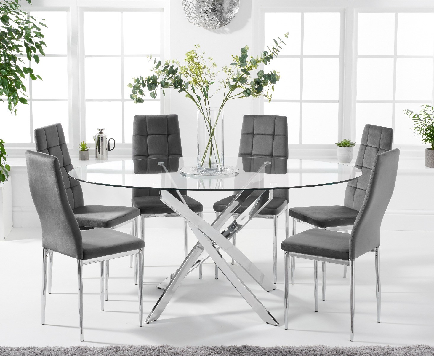 Product photograph of Bernini 165cm Oval Glass Dining Table With 8 Grey Angelo Velvet Chairs from Oak Furniture Superstore