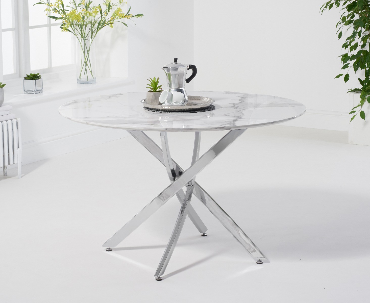 Photo 1 of Carter 120cm round white marble table with 6 black marco chairs