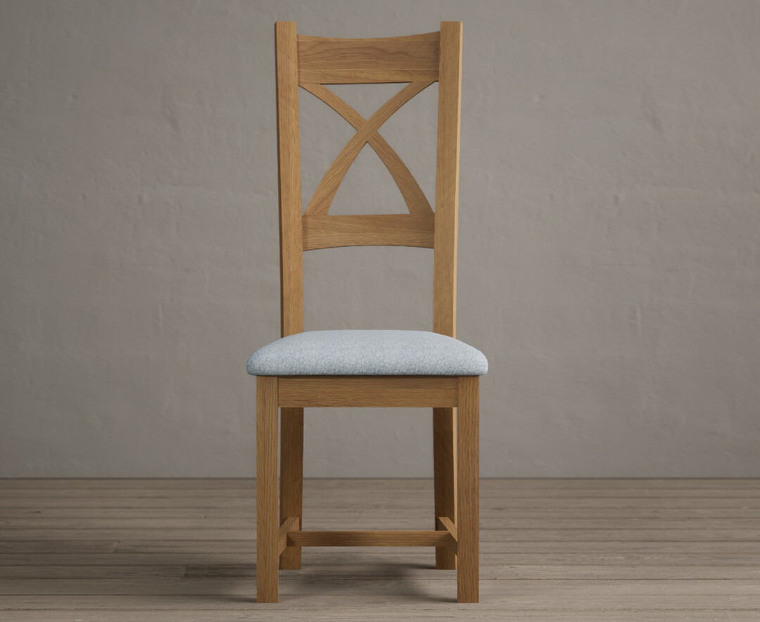 Product photograph of Natural Solid Oak X Back Dining Chairs With Blue Fabric Seat Pad from Oak Furniture Superstore