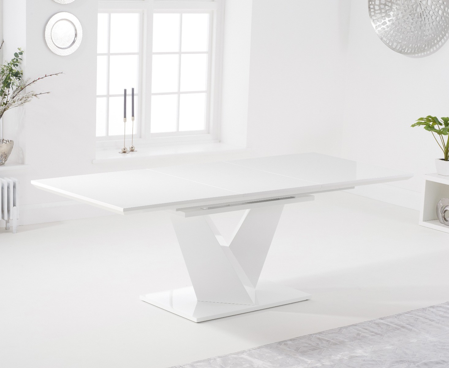 Photo 3 of Vittorio 160cm white high gloss extending dining table with 4 black austin faux leather chairs