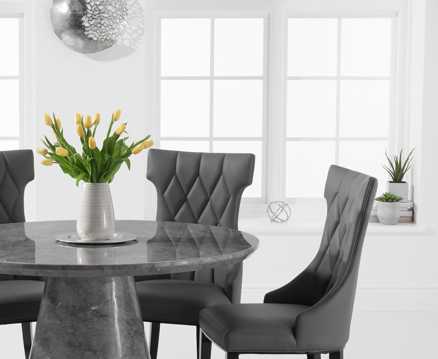 Photo 1 of Ravello 130cm round grey marble dining table with 4 grey sophia chairs