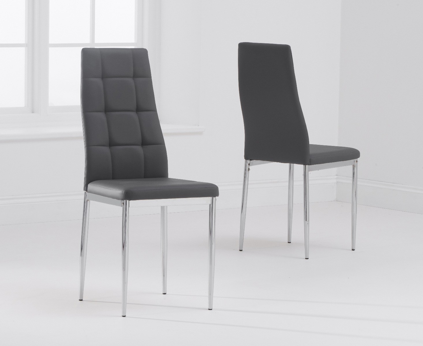 Product photograph of Angelo Grey Faux Leather Dining Chairs from Oak Furniture Superstore