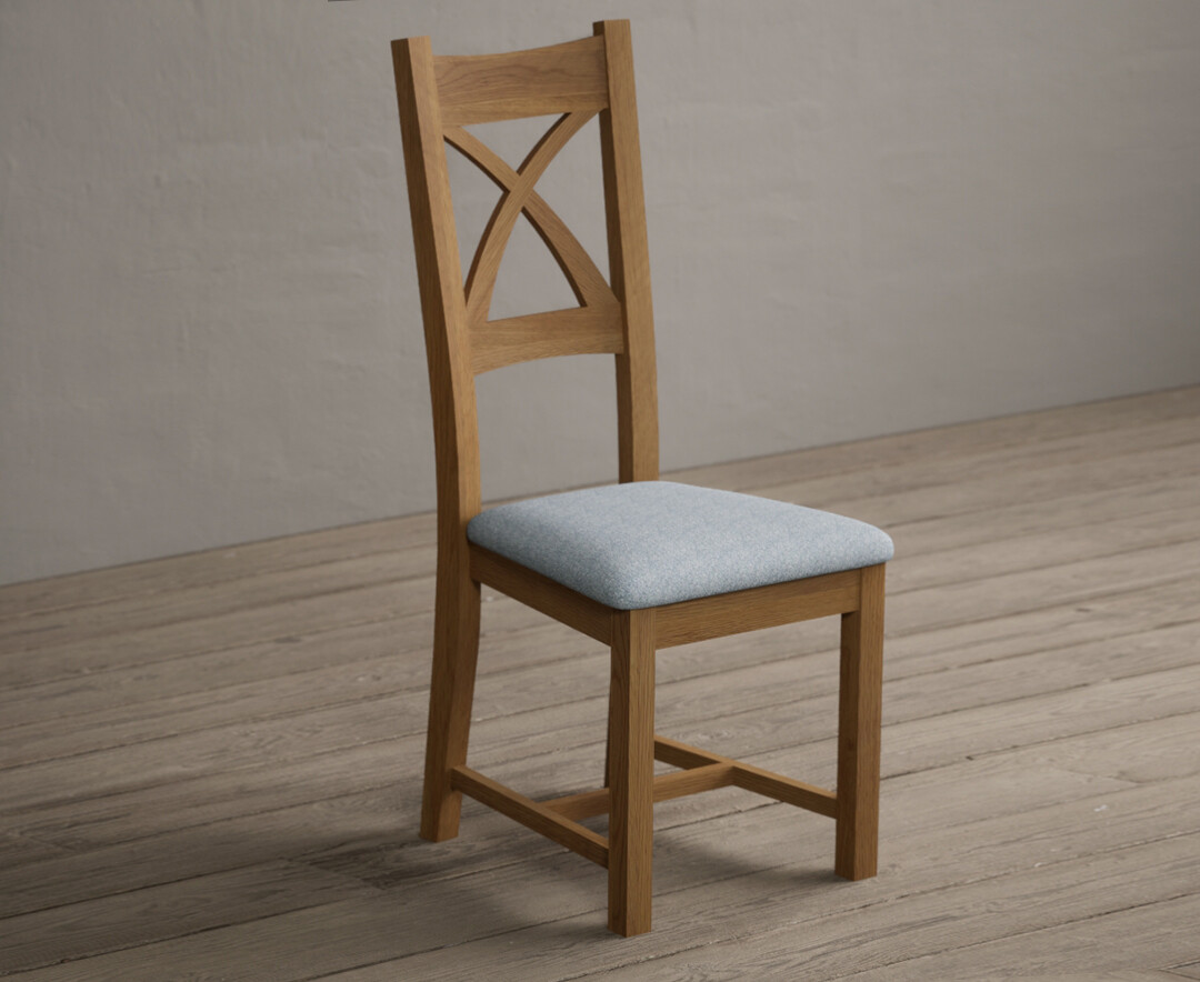 Photo 1 of Natural solid oak x back dining chairs with blue fabric seat pad