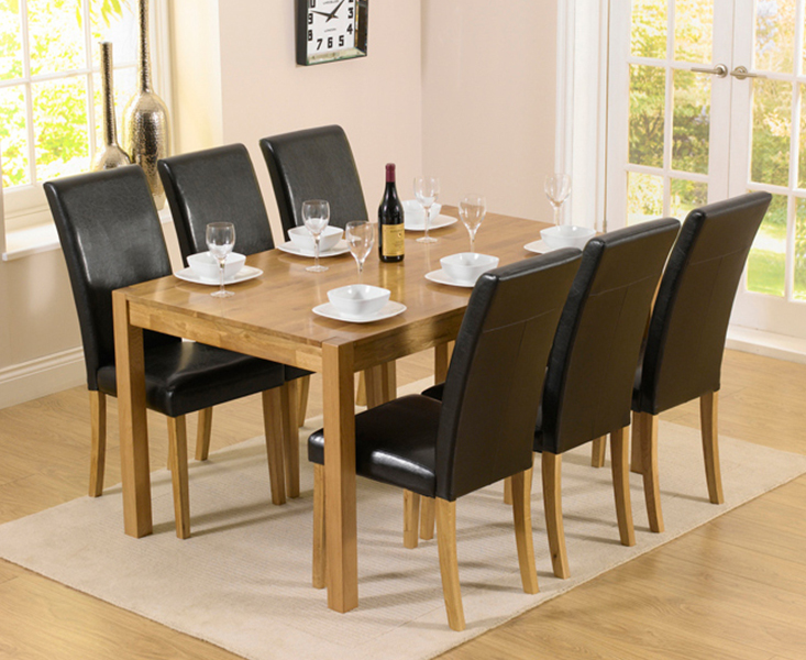 Product photograph of Oxford 150cm Solid Oak Dining Table With 8 Black Olivia Chairs from Oak Furniture Superstore