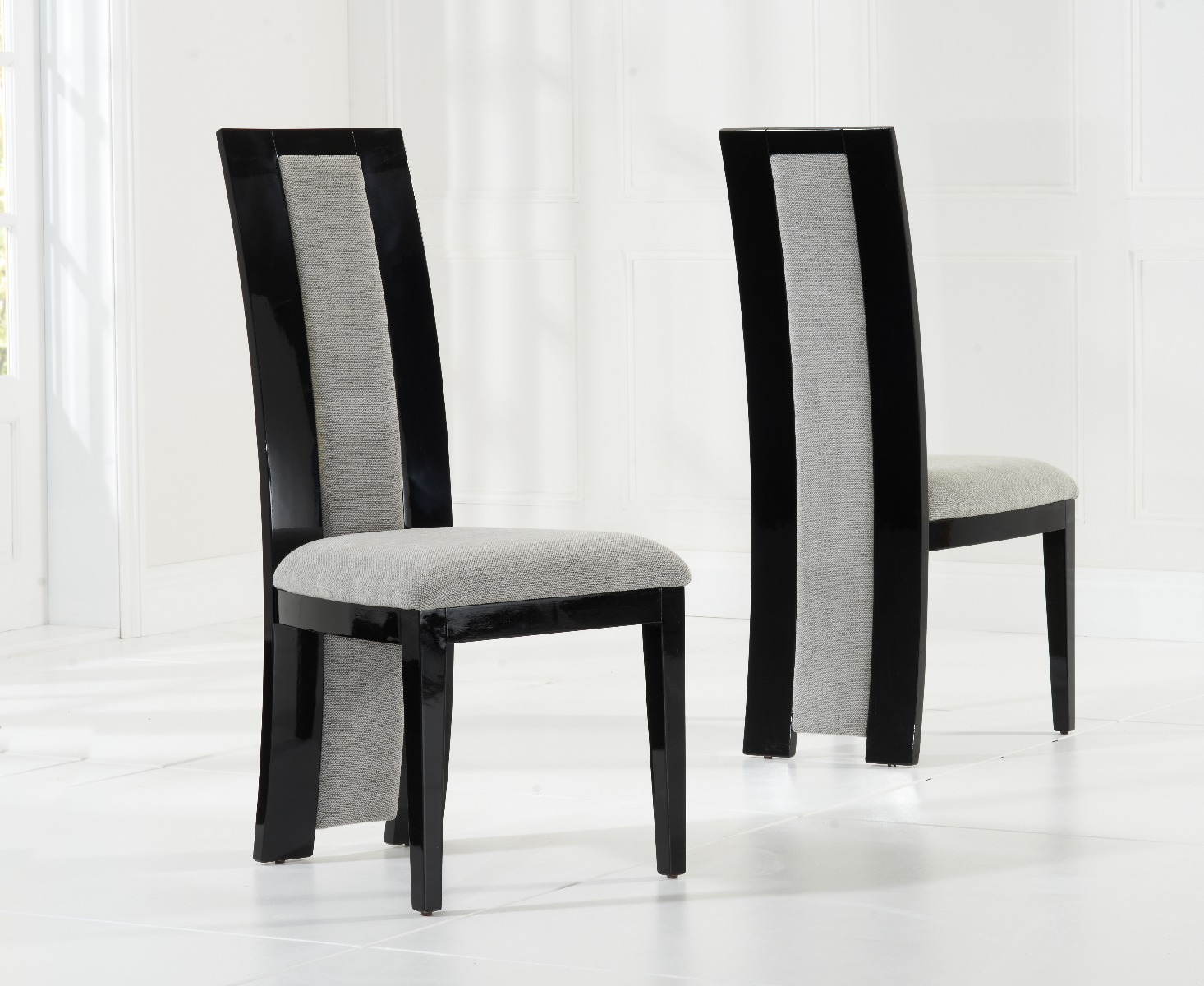 Product photograph of Novara Black Solid Wood Dining Chairs from Oak Furniture Superstore