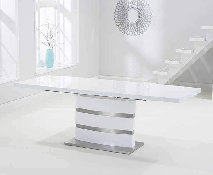 Photo 1 of Extending vicenza 160cm white high gloss dining table with 6 black aldo chairs