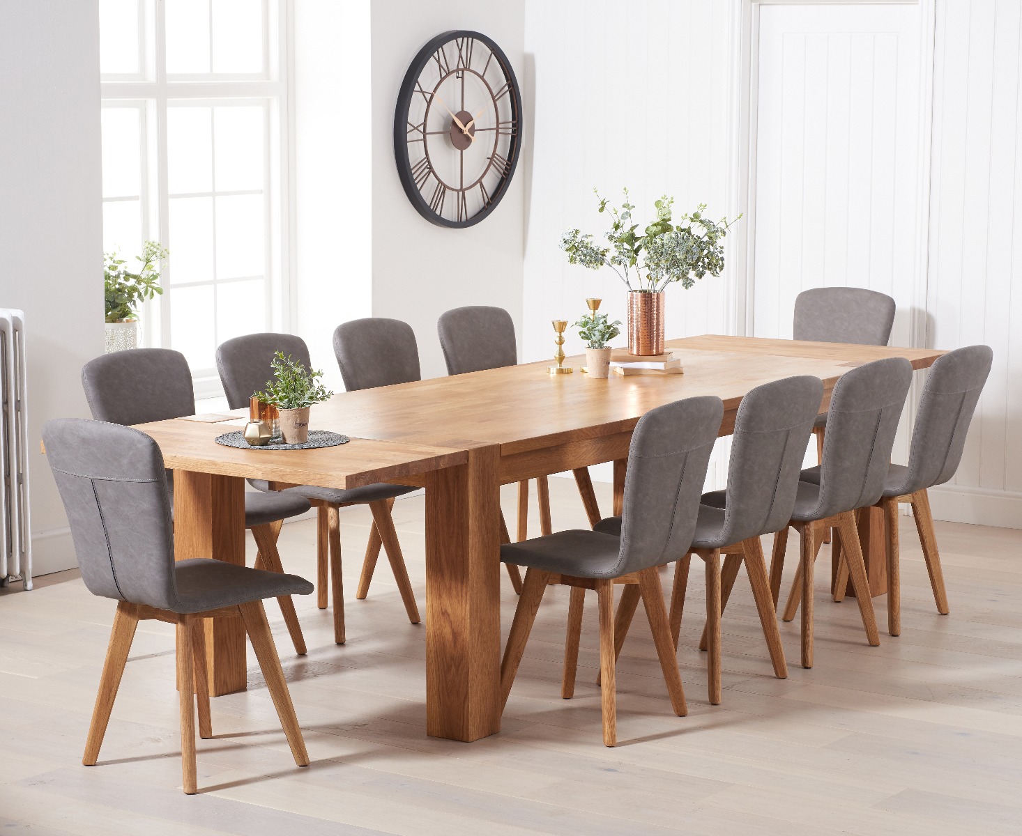 Product photograph of Extending Sheringham 240cm Solid Oak Table With 10 Grey Ruben Faux Leather Chairs from Oak Furniture Superstore