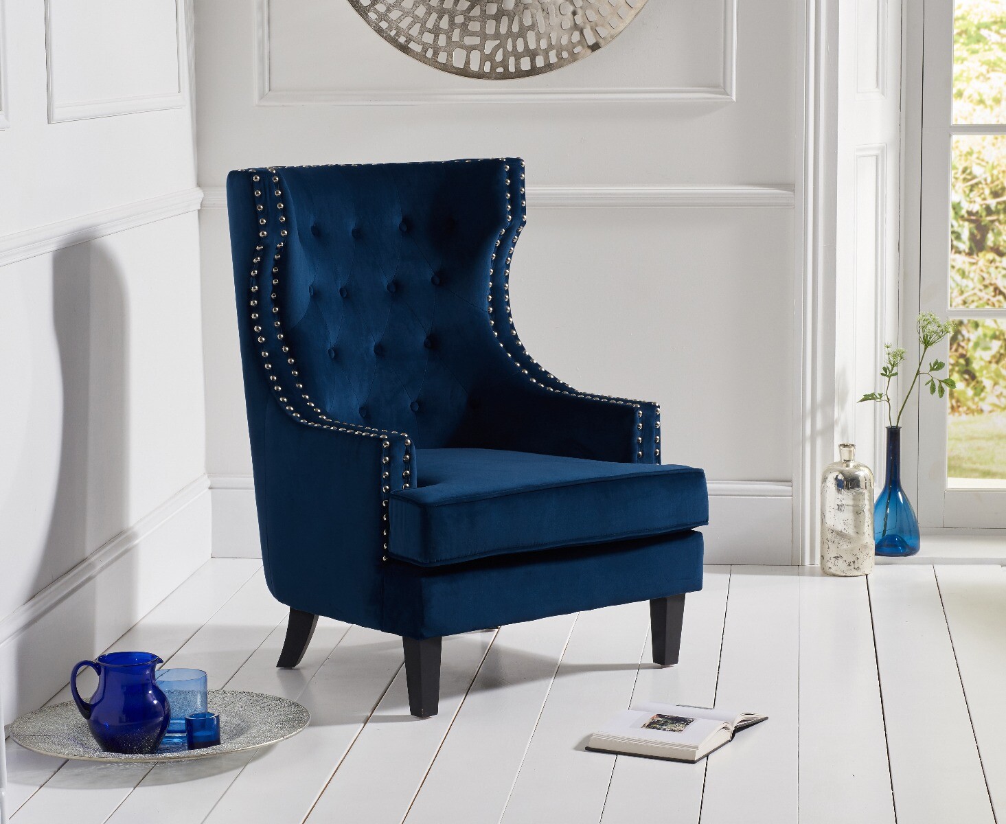 Product photograph of Evelyn Blue Velvet Armchair from Oak Furniture Superstore