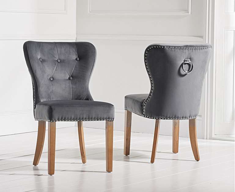 Product photograph of Keswick Studded Grey Velvet Oak Leg Dining Chairs from Oak Furniture Superstore