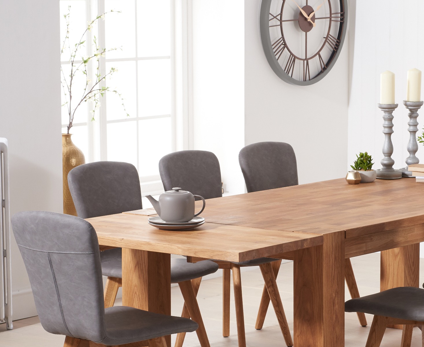 Photo 1 of Extending sheringham 200cm solid oak table with 8 grey ruben faux leather chairs