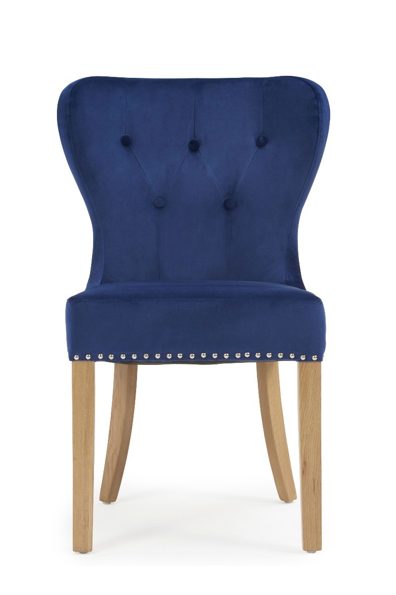 Photo 1 of Knightsbridge studded blue velvet oak leg dining chairs