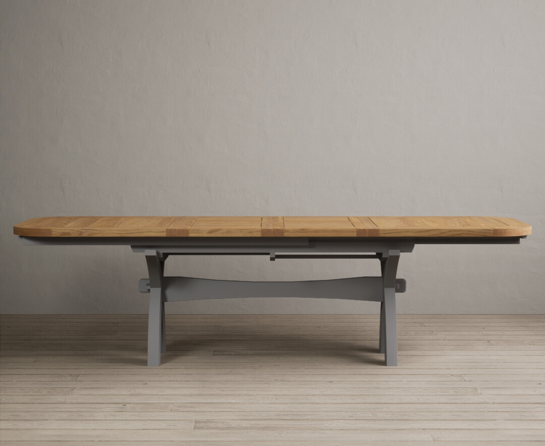 Product photograph of Extending Olympia 180cm Oak And Light Grey Painted Dining Table from Oak Furniture Superstore