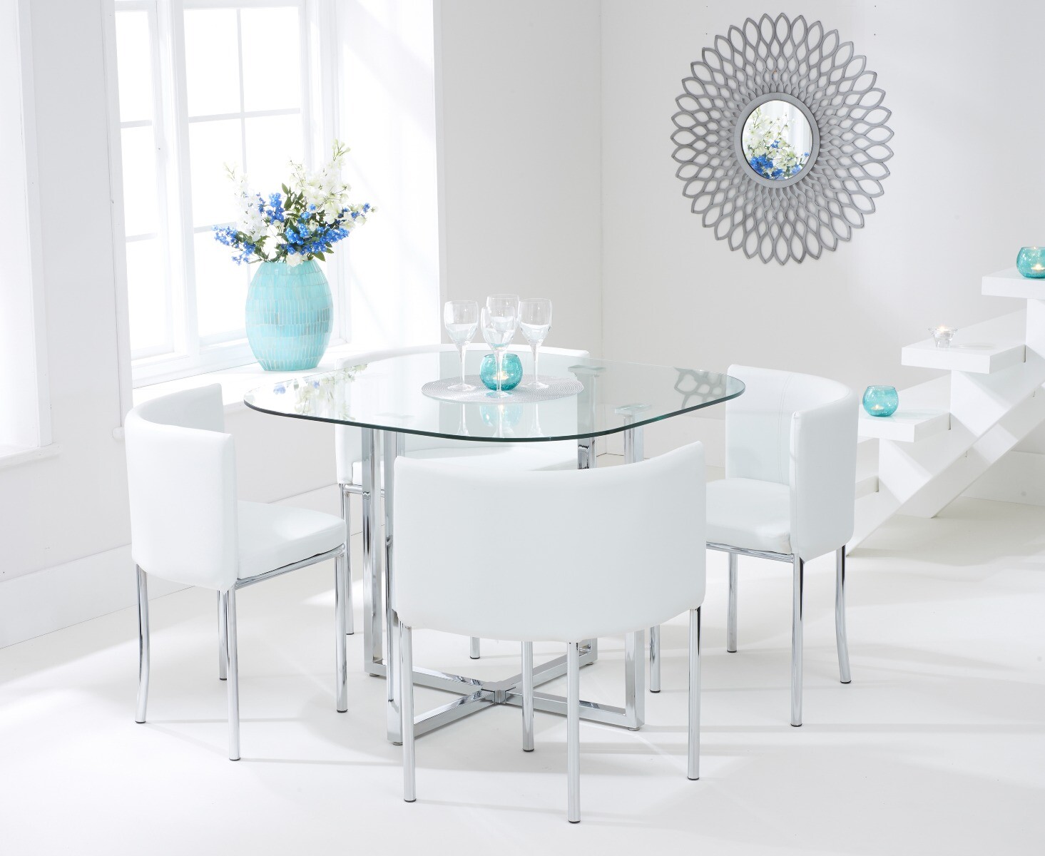 Product photograph of Algarve Clear Glass Dining Table With 4 White Rhodes Chairs from Oak Furniture Superstore
