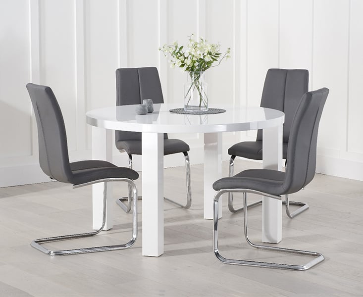 Product photograph of Atlanta 120cm White High Gloss Round Dining Table With 4 Grey Gianni Chairs from Oak Furniture Superstore