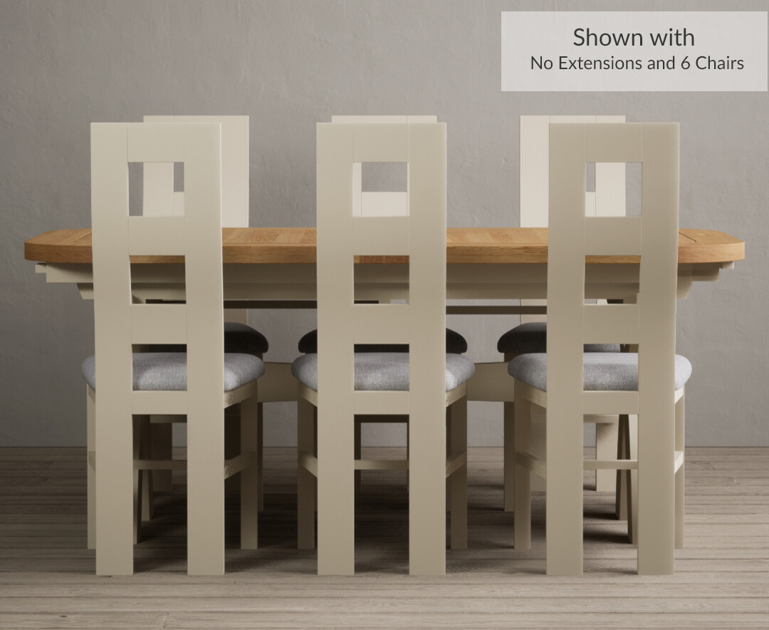Photo 1 of Extending atlas 180cm oak and cream dining table with 12 oak flow back chairs