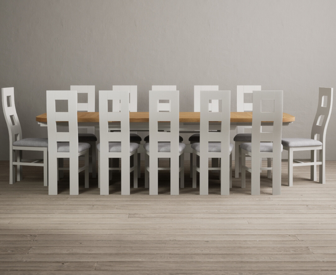 Product photograph of Extending Atlas 180cm Oak And Signal White Dining Table With 12 Oak Flow Back Chairs from Oak Furniture Superstore