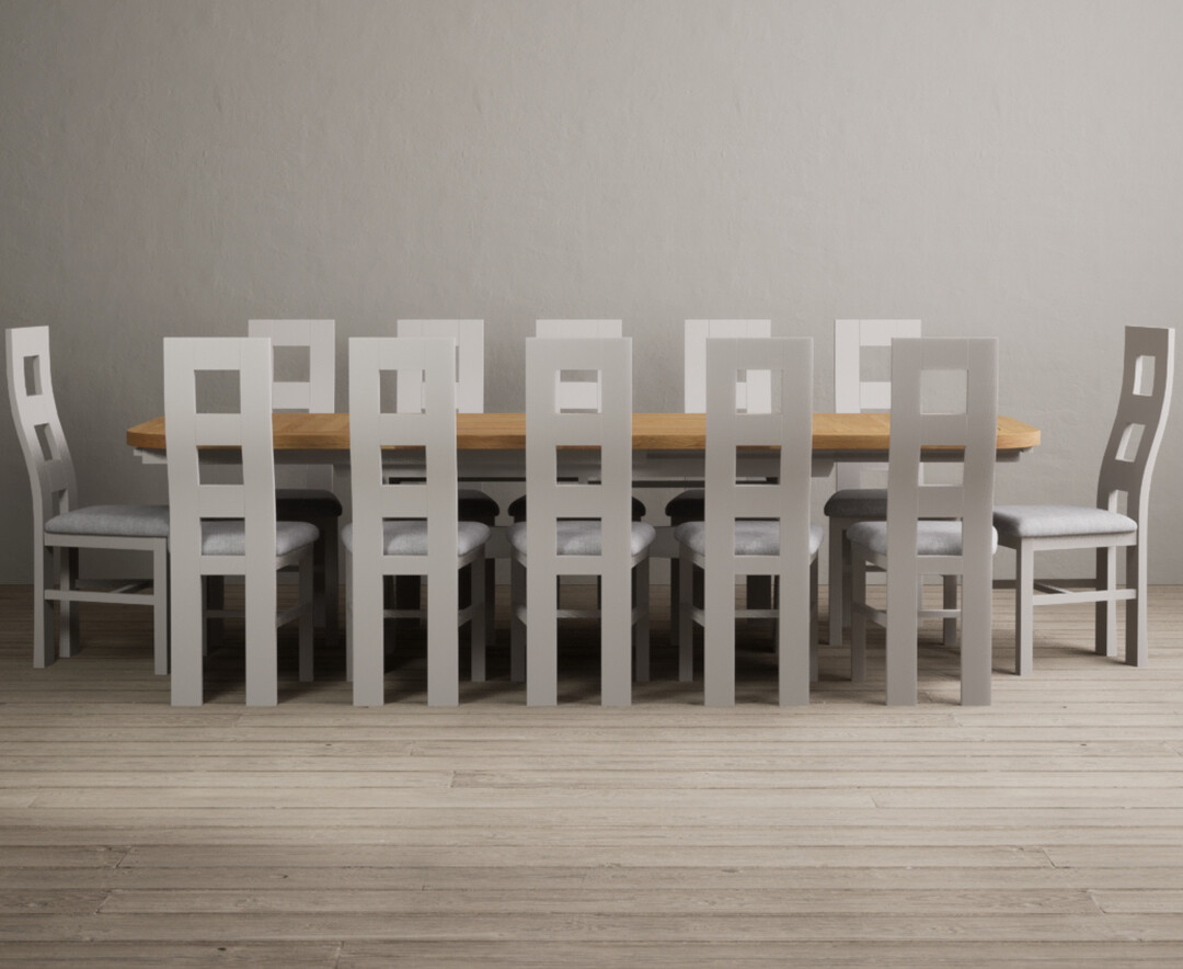 Product photograph of Extending Atlas 180cm Oak And Soft White Dining Table With 10 Charcoal Grey Flow Back Chairs from Oak Furniture Superstore