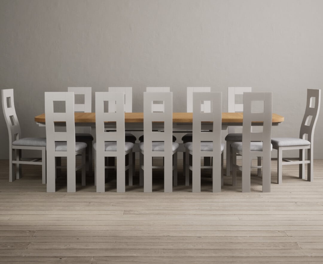 Product photograph of Extending Atlas 180cm Oak And Soft White Dining Table With 6 Light Grey Flow Back Chairs from Oak Furniture Superstore