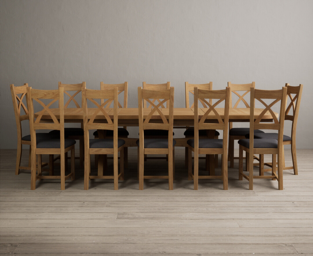 Product photograph of Extending Atlas 180cm Solid Oak Dining Table With 12 Brown X Back Chairs from Oak Furniture Superstore.