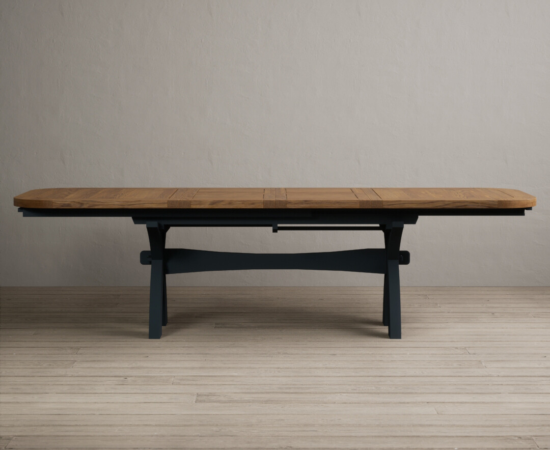 Product photograph of Extending Olympia 180cm Oak And Dark Blue Painted Dining Table from Oak Furniture Superstore