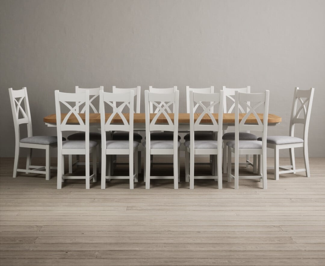 Product photograph of Atlas 180cm Oak And Chalk White Extending Dining Table With 12 Blue X Back Chairs from Oak Furniture Superstore