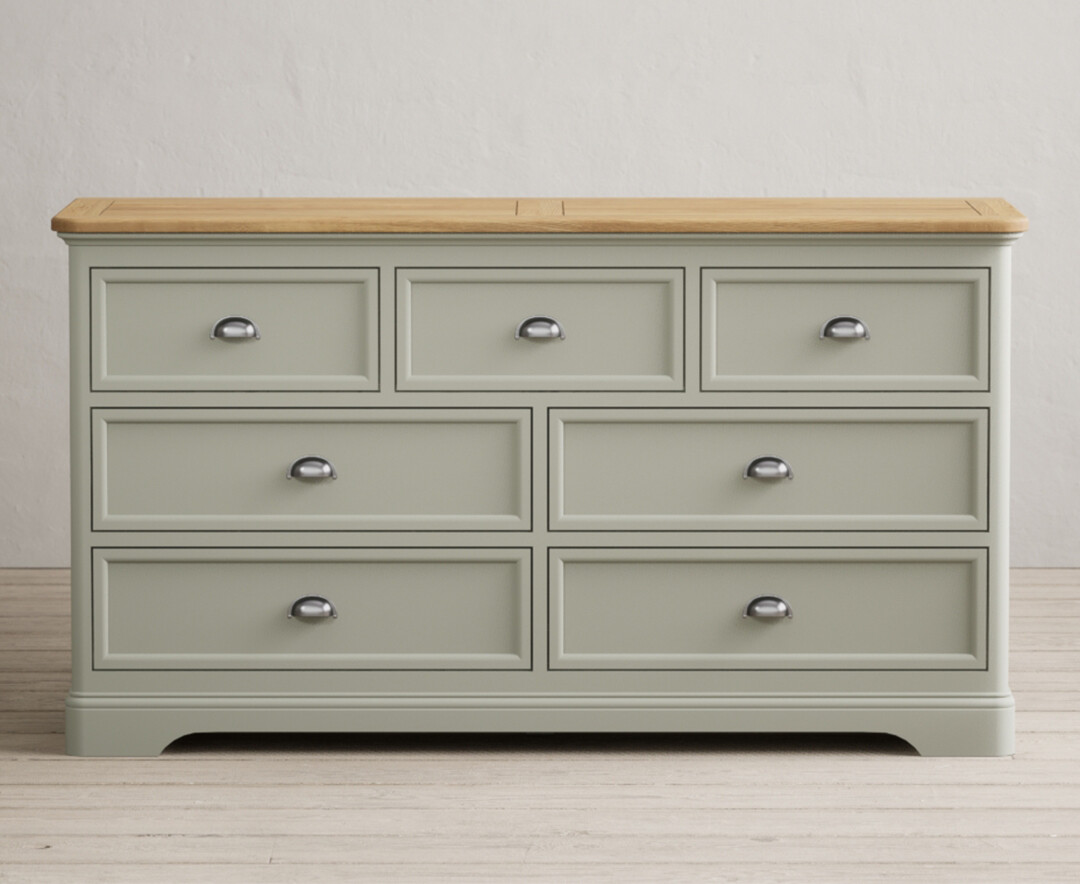 Product photograph of Bridstow Soft Green Painted Wide Chest Of Drawers from Oak Furniture Superstore