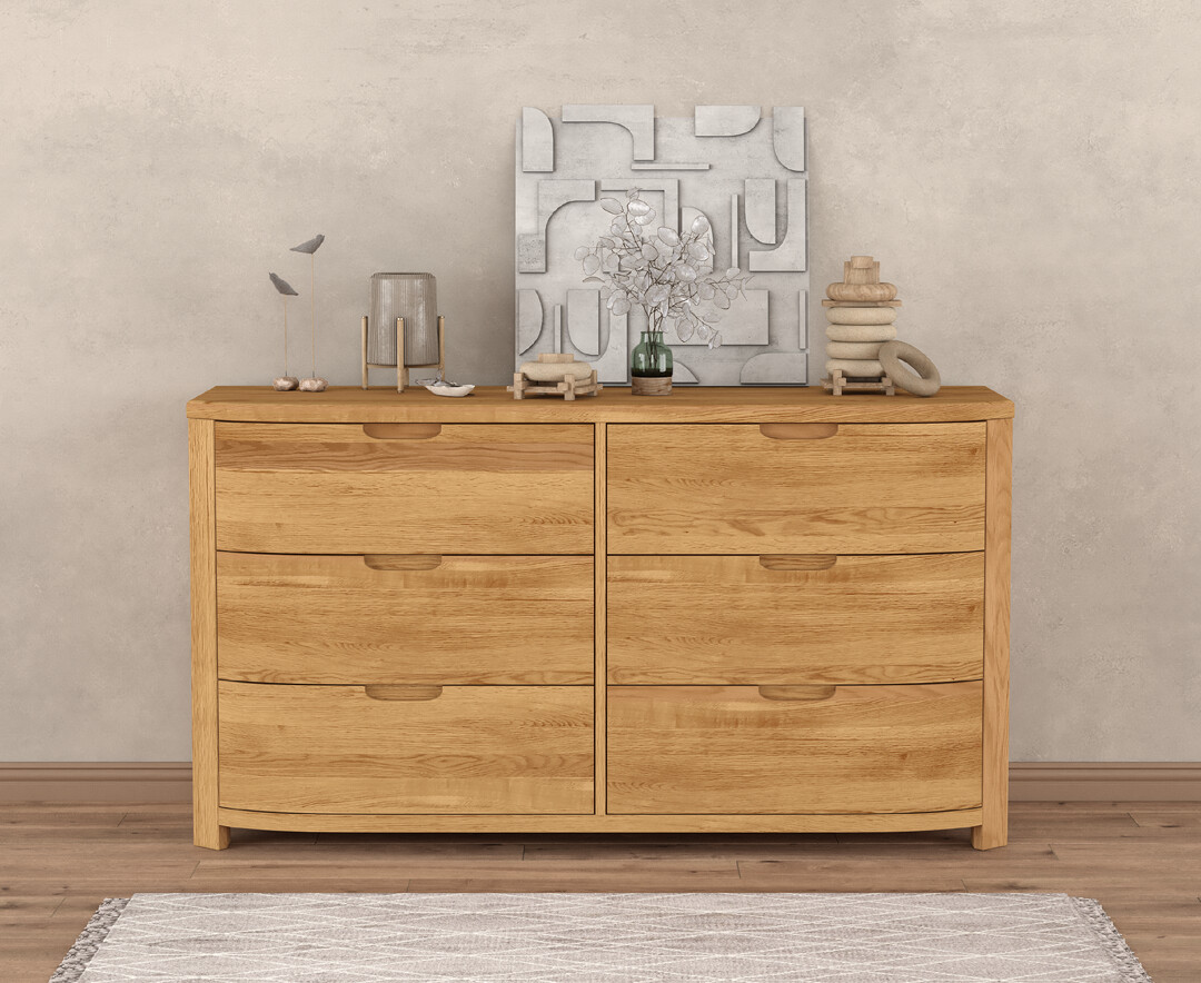 Product photograph of Somerton Curved Solid Oak Wide Chest Of Drawers from Oak Furniture Superstore