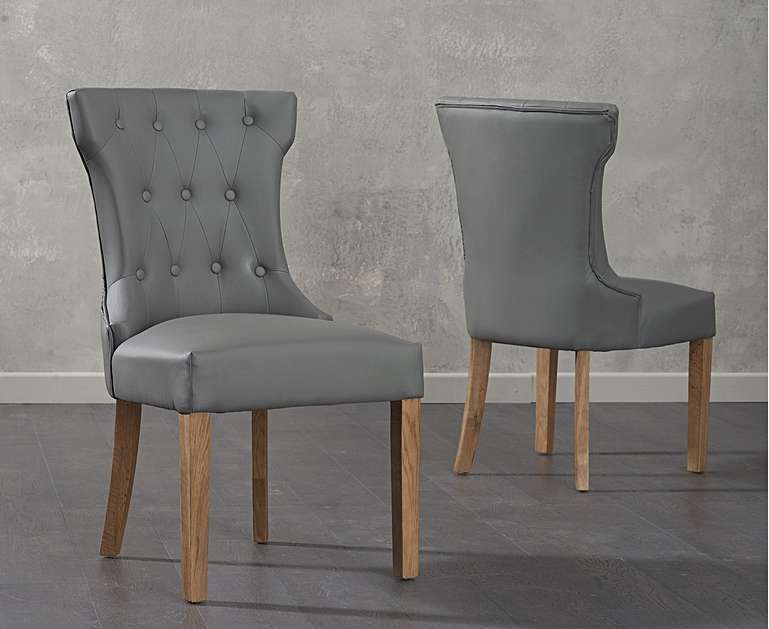 Product photograph of Clara Grey Faux Leather Dining Chairs from Oak Furniture Superstore
