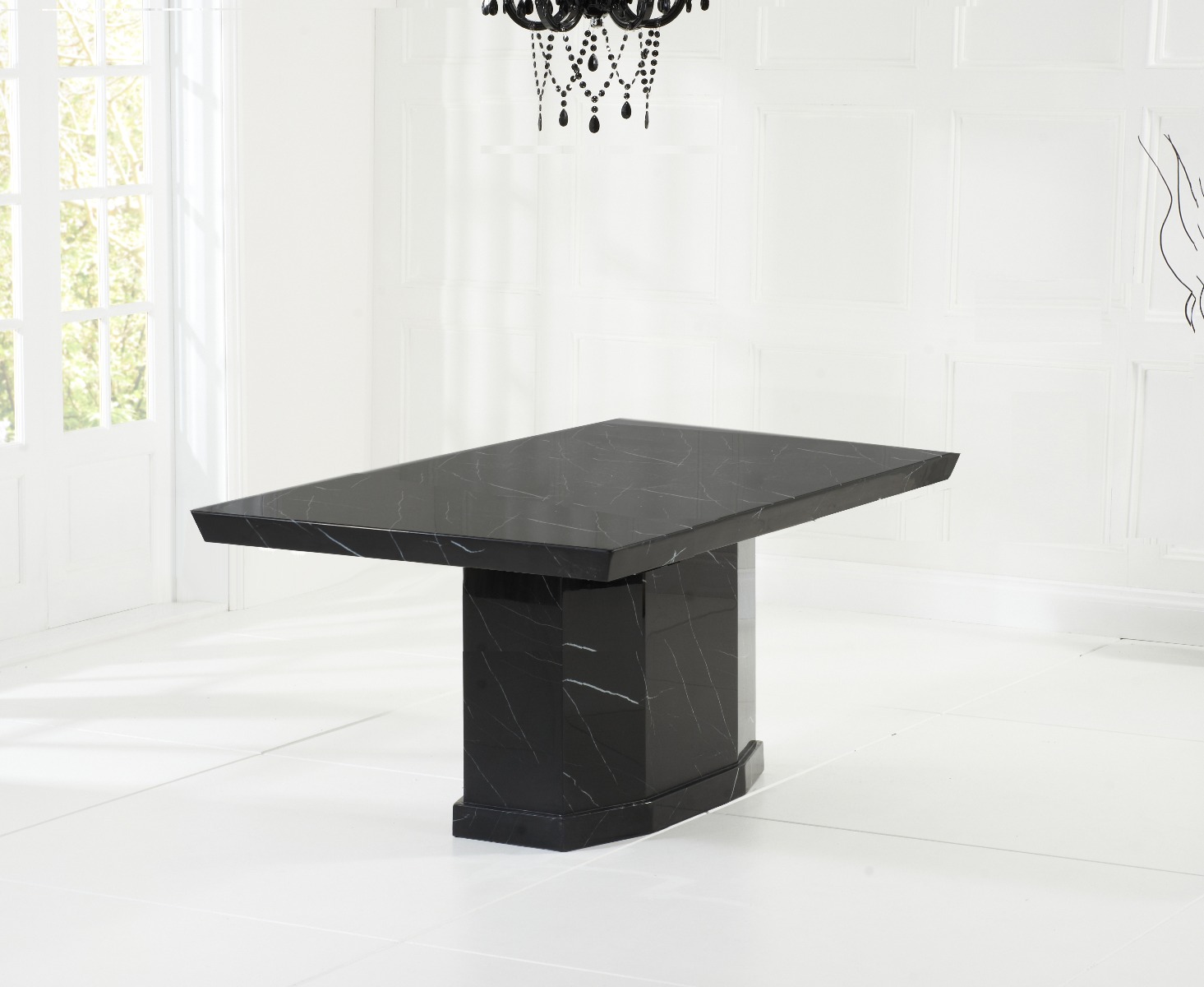 Product photograph of Carvelle 160cm Black Pedestal Marble Dining Table from Oak Furniture Superstore.