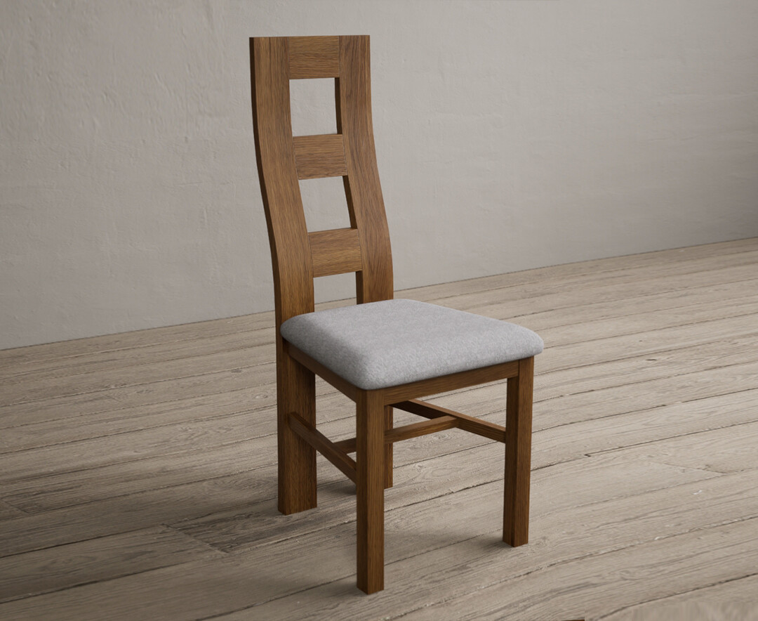Photo 2 of Rustic solid oak flow back dining chairs with light grey fabric seat pad