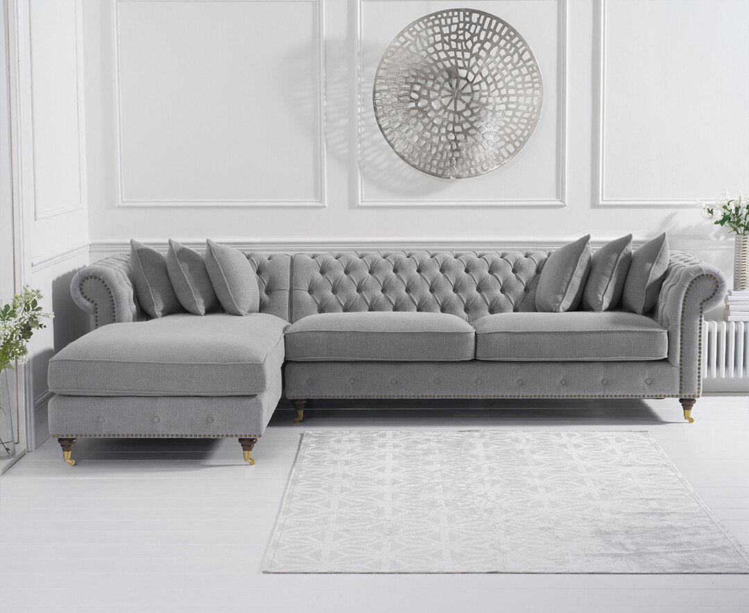 Product photograph of Chiswick Extra Large Grey Linen Left Facing Chesterfield Corner Chaise Sofa from Oak Furniture Superstore