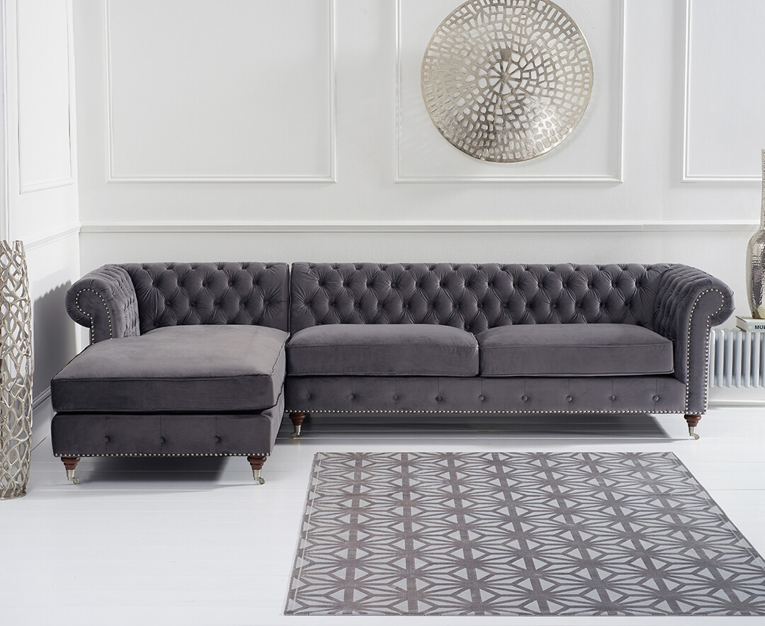 Product photograph of Chiswick Extra Large Dark Grey Velvet Left Facing Chesterfield Corner Chaise Sofa from Oak Furniture Superstore.