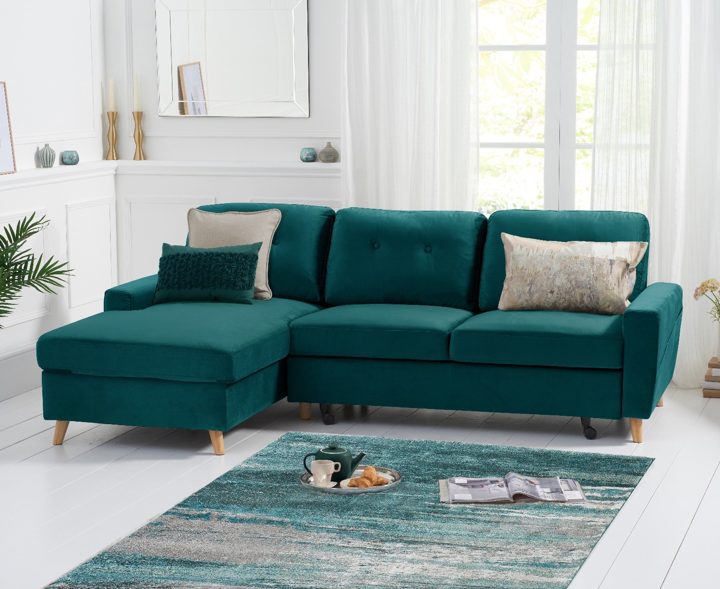 Product photograph of Florence Left Facing Chaise Sofa Bed In Green Velvet from Oak Furniture Superstore