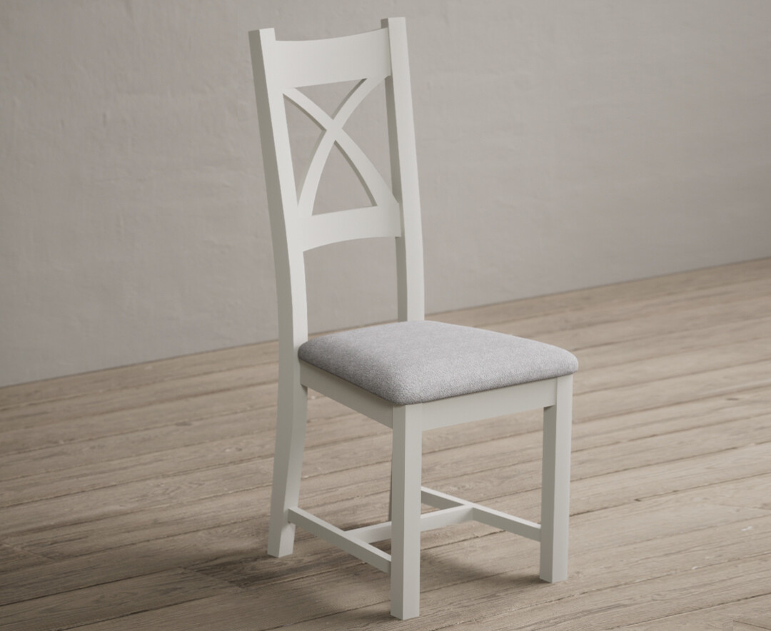 Photo 1 of Painted chalk white x back dining chairs with light grey fabric seat pad