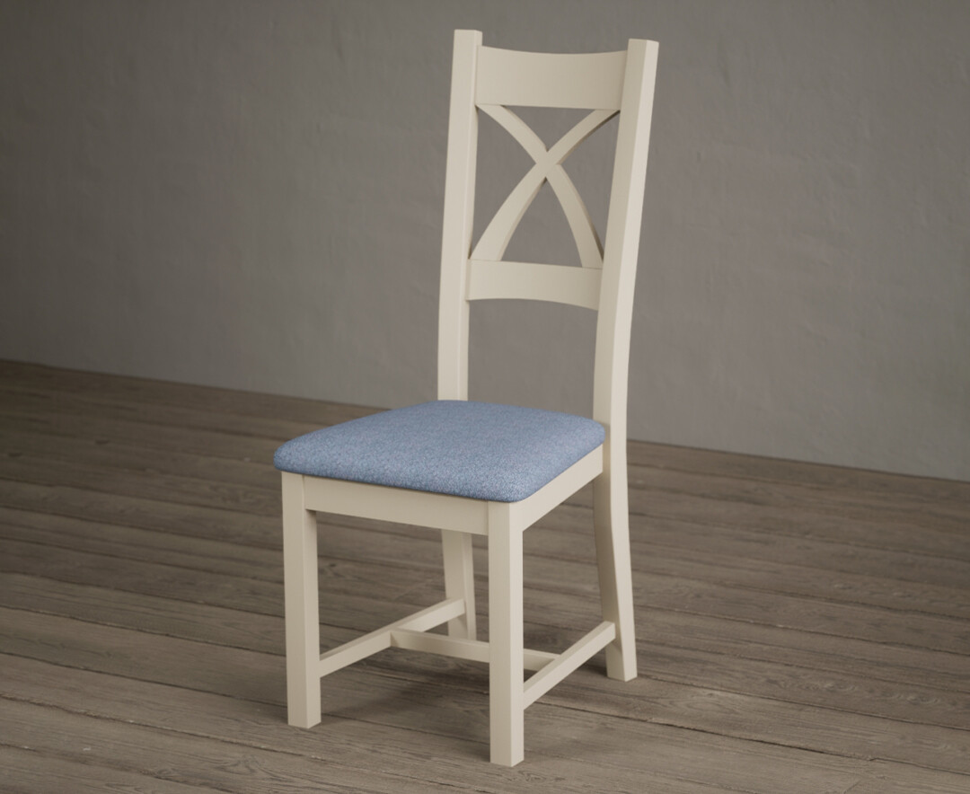 Photo 1 of Painted cream x back dining chairs with blue fabric seat pad