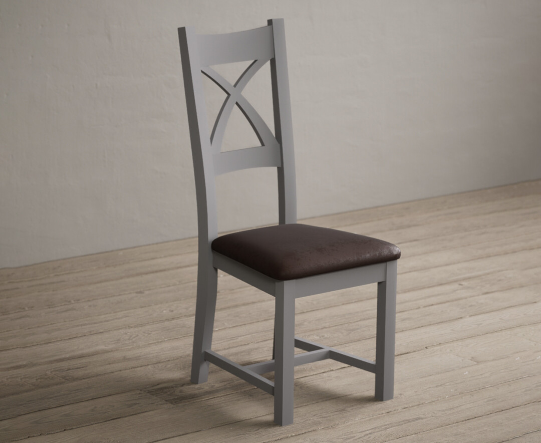 Photo 1 of Painted light grey x back dining chairs with brown suede seat pad