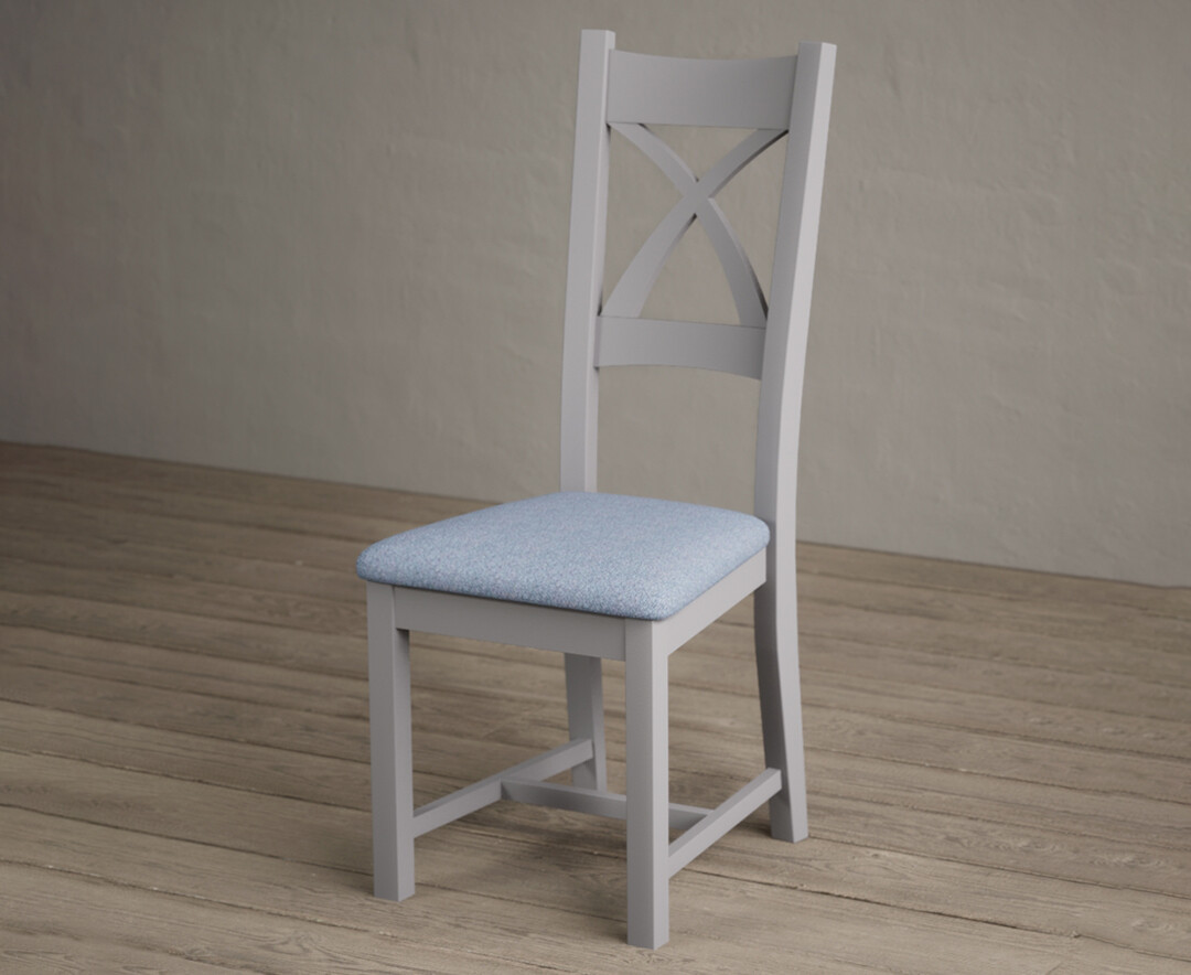 Photo 2 of Painted light grey x back dining chairs with blue fabric seat pad
