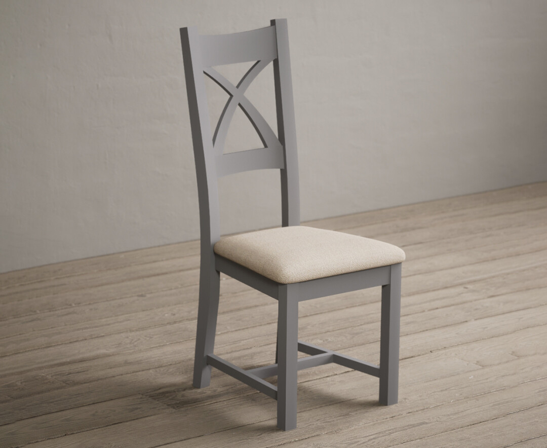 Photo 1 of Painted light grey x back dining chairs with linen seat pad